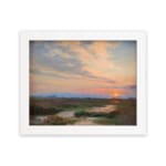 Infidu vintage wall art featuring a peaceful landscape at sunrise with soft blue, pink, and orange skies over lush green fields and distant hills. hung on the wall on a white background