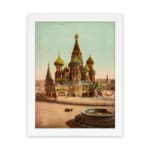 Vintage art print of Saint Basil’s Cathedral with colorful domes, a horse-drawn carriage, and a white frame hung on the wall