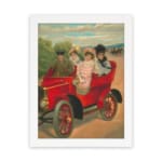 Vintage wall art of red antique car with four people in early 20th-century clothing, riding through the countryside. hung on the wall