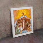 Vintage wall art of the Virgin Mary protecting people under her cloak in earthy tones. displayed on the wall