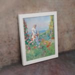 Vintage wall art of a woman in a garden with pastel flowers, ocean view, and soft countryside details. displayed on the wall