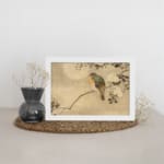 Infidu vintage wall art featuring a delicate bird perched on a branch with small leaves against a soft, neutral background. displayed on the wall art in a white frame