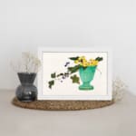 Infidu vintage wall art featuring a blue-green vase with bright yellow flowers, lush green leaves, and delicate purple berries against a light background. displayed on the wall art in a white frame