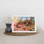 Vintage garden scene with pink flowers, classical figures, and elegant background from Infidu wall art collection. displayed on the wall