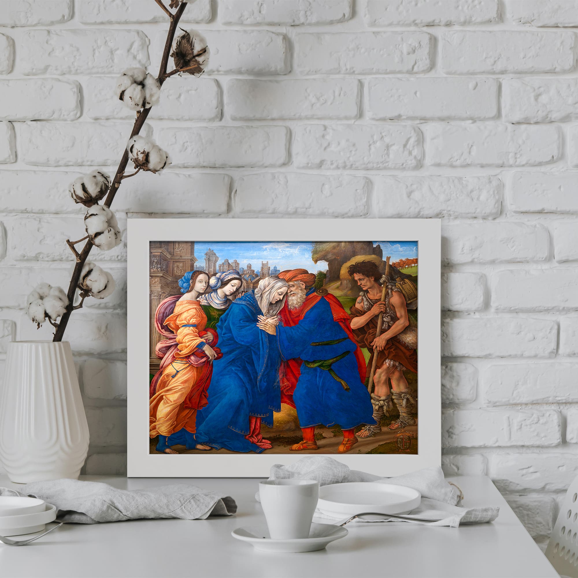Vintage wall art depicting a biblical scene with people in colorful robes, blue, red, and orange, set against architectural elements and open sky. displayed on the wall in a white frame