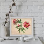 Infidu vintage wall art of blooming pink flowers with green leaves on a warm beige background. displayed on the wall