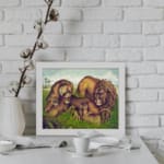 Vintage wall art of a lion family relaxing in a grassy field with earthy tones and a calm, natural background. displayed on the wall