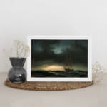 Vintage wall art of a sailing ship on a stormy sea with dark waves and a dramatic, cloudy sky. displayed on the wall