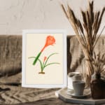 Infidu Elegant Orange Flower Vintage Wall Art featuring a vibrant orange flower with green leaves, framed in white. displayed on the wall