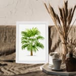 Infidu Vintage Wall Art of a lush tropical plant with green leaves and a brown trunk, framed in white, set against a clean white background. displayed on the wall
