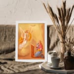 Vintage wall art of an angel and praying woman with glowing light and warm cloudy sky background. displayed on the wall