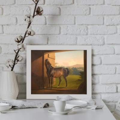 Infidu Vintage Wall Art of a horse standing in a serene stable, with earthy tones and soft natural lighting, ideal for rustic or classic décor. displayed on the wall in a white frame