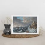 Vintage wall art of a dramatic ocean storm with waves, rocky cliffs, and a stone tower. displayed on the wall