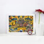 Infidu vintage wall art featuring a majestic dragon in gold, red, and silver tones, surrounded by blue clouds and fiery red flames on a vibrant yellow background. displayed on the wall art in a white frame