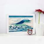 Vintage wall art of Mount Fuji with white cranes and flying birds in a peaceful nature scene. displayed on the wall