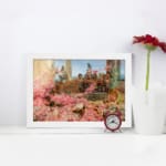 Vintage garden scene with pink flowers, classical figures, and elegant background from Infidu wall art collection. displayed on the wall