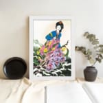 Elegant East Asian woman in floral attire with soft botanical background in vintage wall art print. displayed on the wall