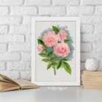 Infidu vintage wall art featuring pink roses with green leaves and a soft blue watercolor background. displayed on the wall