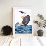Vintage wall art of a woman riding a seashell over bold ocean waves with red and blue cloth, in a dramatic and whimsical seaside scene. displayed on the wall