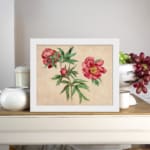 Infidu vintage wall art of blooming pink flowers with green leaves on a warm beige background. displayed on the wall