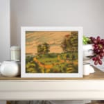 Infidu Countryside vintage wall art showing a sunset glow over winding paths, green hills, trees, people, cows, and horses by a calm river. displayed on the wall