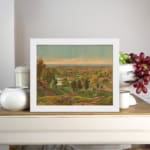 Vintage countryside wall art with soft colors, green hills, and a peaceful sky. displayed on the wall