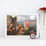 Infidu vintage wall art featuring a classical historical scene with figures in period attire set against a rocky landscape and a partly cloudy sky. displayed on the wall art in a white frame