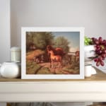 Two horses in a countryside setting with trees, grass, and soft sky tones, framed in white – vintage wall art by Infidu. displayed on the wall