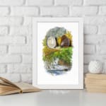 Vintage wall art showing two detailed seashells with seaweed on a white background, framed in black for a coastal nature-inspired look. displayed on the wall