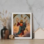 Vintage wall art of Jesus Christ ascending with angels in a soft sky, framed in white with golden accents. displayed on the wall