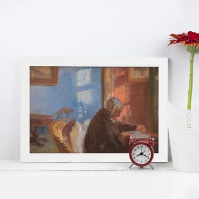 Vintage wall art of a man reading at a desk in a classic interior with muted tones, light streaming through a window, and traditional decor elements. displayed on the wall in a white frame