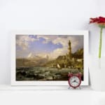 Vintage coastal wall art with waves, a lighthouse, and mountains. displayed on the wall