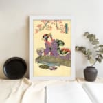 Vintage Japanese woman wall art with cherry blossoms in soft pink, wearing a purple kimono on a beige background. displayed on the wall