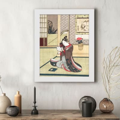 Infidu Asian-style vintage wall art featuring a traditionally dressed couple in a serene indoor setting with intricate details. displayed on the wall in a white frame