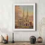 Majestic cathedral at sunset with pointed spires and warm-toned sky in vintage wall art design. displayed on the wall