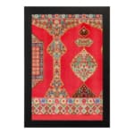 Vintage wall art with intricate red and gold patterns, floral and geometric designs, and a black frame for a timeless, decorative appeal. hung on the wall