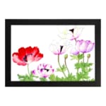 Vintage floral wall art with red, purple & white flowers, green leaves, and a black frame on a white background. hung on the wall