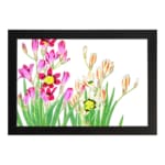 Vintage floral wall art with pink, yellow, and cream flowers and green leaves, framed in black. hung on the wall