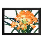Infidu Vintage Floral Wall Art with bright orange flowers, yellow centers, dark green leaves, and a black frame on a white background. hung on the wall