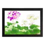 Infidu Vintage Floral Wall Art with pink, purple, and white flowers surrounded by green leaves on a white background, framed in black. hung on the wall