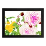Vintage floral wall art with pink and white roses, red buds, and green leaves in a black frame on a white background. hung on the wall