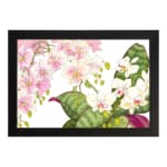 Infidu vintage orchid wall art with pink and white orchids and green leaves, framed in black for an elegant, timeless look. hung on the wall