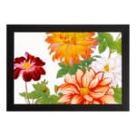 Vintage floral wall art with large orange, red, and white flowers, green leaves, and a black frame on a white background. hung on the wall