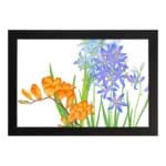 Vintage floral wall art with orange and blue flowers, green leaves, and a white background, framed in black for a classic and elegant look. hung on the wall