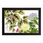 Vintage floral wall art with soft yellow and light purple flowers, green leaves with dark veins, and a white background. hung on the wall