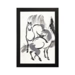Infidu vintage wall art featuring two horses in black and white ink with bold brushstrokes, creating a timeless and dynamic design. hung on the wall on a white background