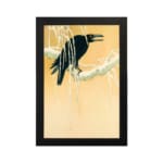 Infidu vintage wall art featuring a black crow perched on a snow-covered tree against a soft beige or light golden background, creating a timeless and artistic winter scene. hung on the wall on a white background