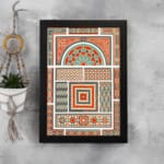 Infidu Vintage Wall Art with intricate geometric patterns in red, orange, beige, teal, and green, featuring symmetrical and decorative designs. displayed on the wall in a black frame
