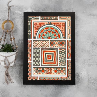 Infidu Vintage Wall Art with intricate geometric patterns in red, orange, beige, teal, and green, featuring symmetrical and decorative designs. displayed on the wall in a black frame