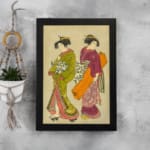 Vintage Japanese wall art with two women in traditional kimonos, featuring rich colors, fine details, and a soft beige background in a black frame. displayed on the wall